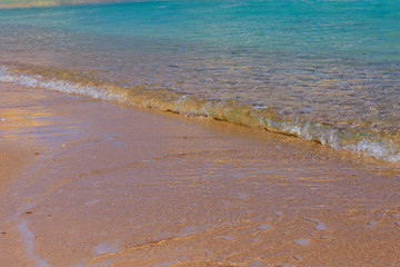Closeup of the sand on beach and Red sea water