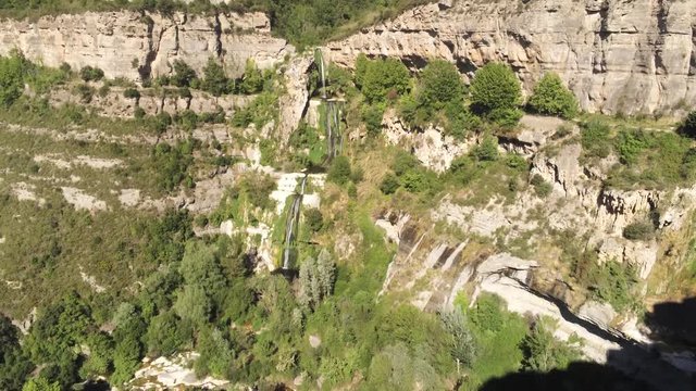 Sant Miquel de Fai. Natural Park with waterfalls and monastery in Barcelona. Catalonia,Spain. 4k Drone Video