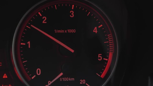 car tachometer shows engine speed
