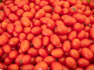 Cherry tomato group in the market. Top view heap of cherry tomato.