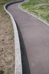 A curved road in a park