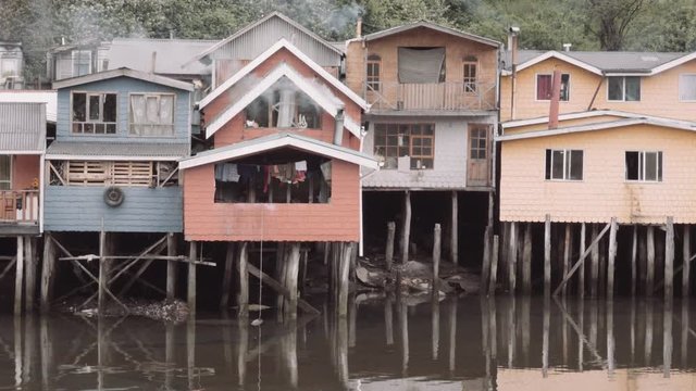 Palafito houses above the water in Castro, Chiloe, Chile. 4k