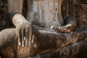 Fototapeta na wymiar Long Fingers of Giant Buddha at Ayuthaya, Sukothai Thailand