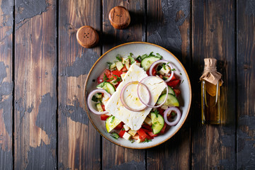 Feta cheese salad in ceramic bowl
