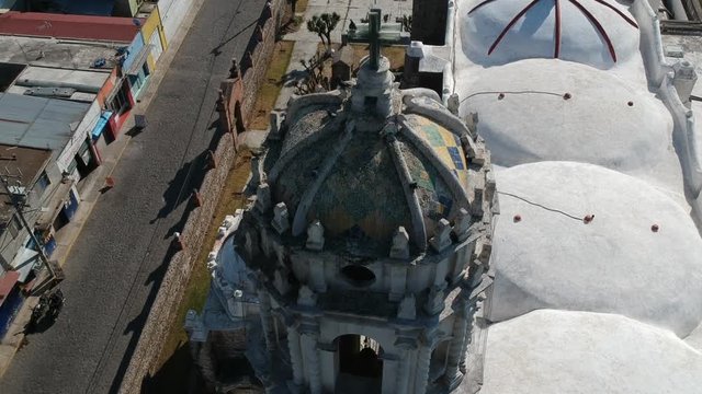 Drone aerial view of some baroque church dome and birds