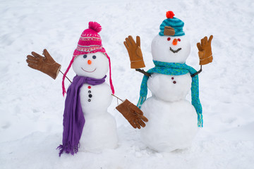 Happy funny snowman in the snow. Merry Christmas and Happy new year. Christmas sale discounts. New year concept.