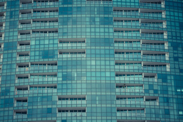 Fototapeta premium Glass windows of modern office building