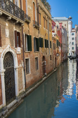 Fototapeta na wymiar Narrow canals are famous and typical in Venice,Italy, 2019