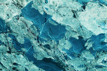 Wall. Blue with a texture of stone. Beautiful unusual background.