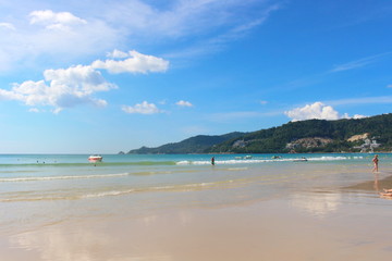 Phuket Province, Thailand - November17, 2017: Nai Harn Beach. Beautiful beach and sea in Phuket, Thailand.   Traveller from around the world come to relax in the summer holidays.