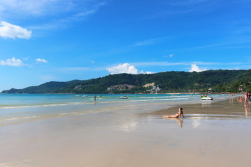 Fototapeta na wymiar Phuket Province, Thailand - November17, 2017: Nai Harn Beach. Beautiful beach and sea in Phuket, Thailand. Traveller from around the world come to relax in the summer holidays.