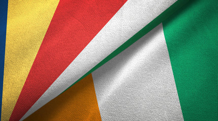Fototapeta na wymiar Seychelles and Cote d'Ivoire Ivory coast two flags textile fabric texture 