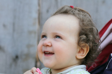 Portrait of the cute one-year-old girl.