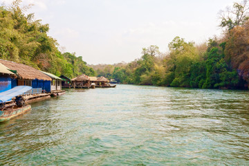 Fototapeta premium Floating tourist huts on the river Kwai, Thailand.