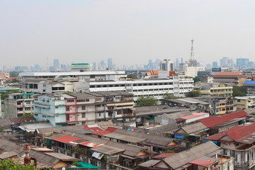 Bangkok Province, Thailand - February 3, 2019: Aerial view of Bangkok modern office buildings and temple. Take a picture from Wat Sraket Rajavaravihara (Golden Mount).
