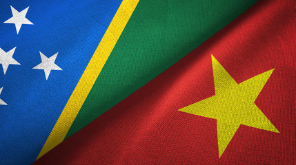 Solomon Island and Vietnam two flags textile cloth, fabric texture