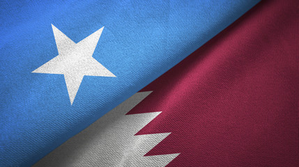 Somalia and Qatar two flags textile cloth, fabric texture