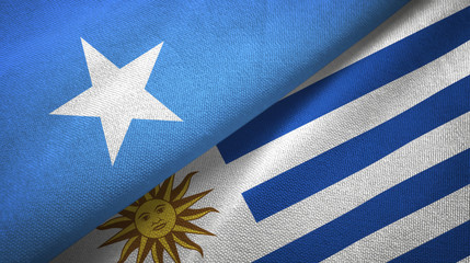 Somalia and Uruguay two flags textile cloth, fabric texture