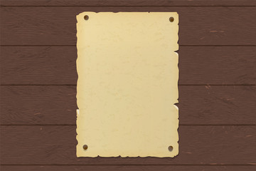 Old ripped brown paper poster nailed to a wooden wall.