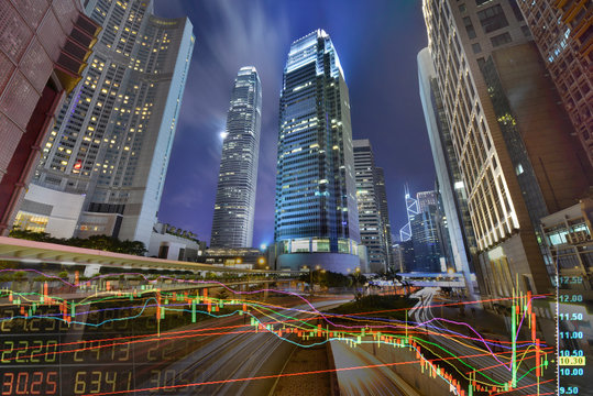 Statistic Graph Index Of Stock Market Exchange On A Skyscraper In Hong Kong At Night Background 