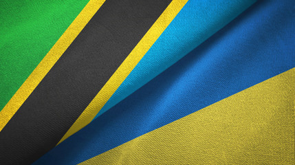 Tanzania and Ukraine two flags textile cloth, fabric texture
