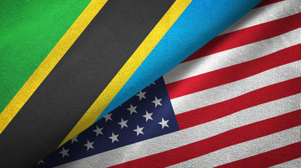 Fototapeta premium Tanzania and United States two flags textile cloth, fabric texture
