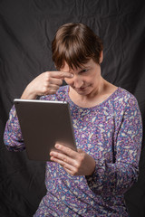 Paris, France - 05 19 2019: Studio photo session with my girlfriend. Living with a digital tablet