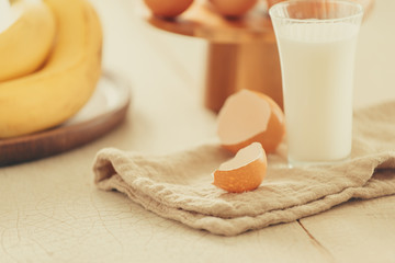 Ingredients and tools for baking sweet cake with banana and almonds