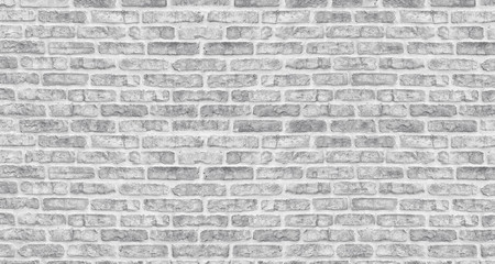Fototapeta na wymiar White washed brick wall texture. Rough light gray brickwork. Whitewashed vintage background