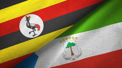Fototapeta premium Uganda and Equatorial Guinea two flags textile cloth, fabric texture