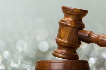 Wooden gavel on table close up. Justice concept
