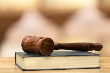 Wooden gavel on table close up. Justice concept