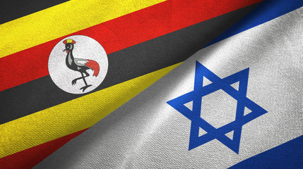 Fototapeta premium Uganda and Israel two flags textile cloth, fabric texture