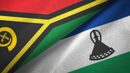 Fototapeta premium Vanuatu and Lesotho two flags textile cloth, fabric texture