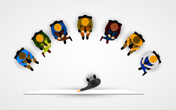 Businessman making a presentation to sitting people.