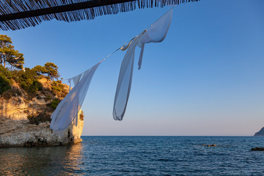 White cloths, developing on the beach of Zakynthos (Greece)
