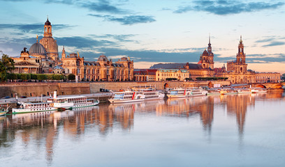 Fototapeta na wymiar Dresden. Germany, during twilight blue hour with reflection of the city in Elbe River.