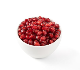 Pile of Pomegranate Seeds in Bowl Isolated on White Background