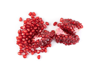 Scattered Pomegranate Seeds Isolated on White Background
