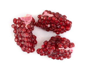 Scattered Pomegranate Seeds Isolated on White Background