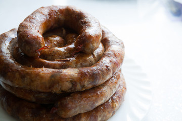 delicious juicy baked sausages in the oven
