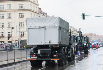 Police workers are riding police truck on military parade