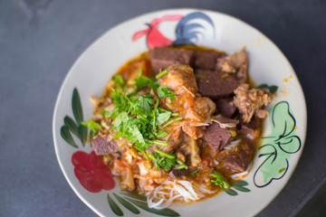 Nam Nguan Noodle, Rice noodles with spicy pork sauce.