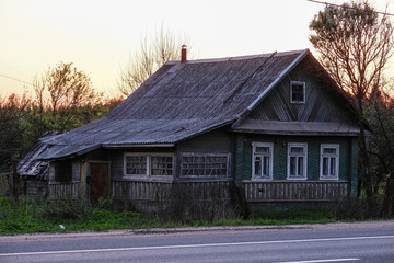 image of old country house near the road
