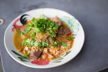 Nam Nguan Noodle, Rice noodles with spicy pork sauce.