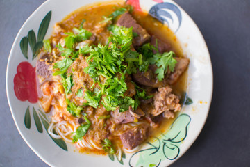 Nam Nguan Noodle, Rice noodles with spicy pork sauce.