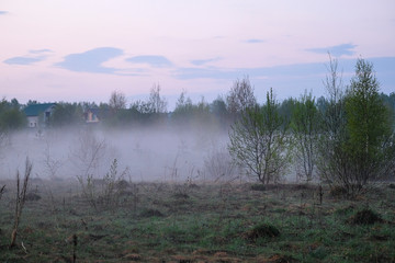 Landscape with the image of fog on lake Seliger in Russia