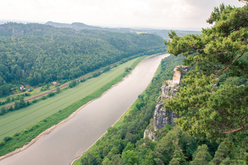 Mountain landscape of Saxon Switzerland. Forest-covered rocks. River valley. Aerial view
