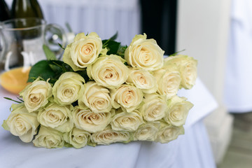 A bouquet of roses on the table