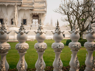 Wat Rong Khun (White Temple), Beautiful famous white temple located in Chiang Rai northern Thailand. Close-up of the white fence.